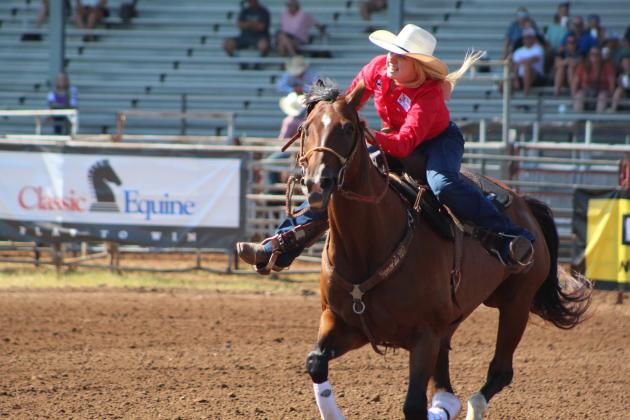 Matraya Haynes, of Maud, competes in barrel racing.