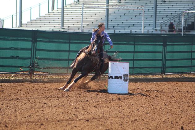 Jessica Staff, of Tecumseh, competes in barrel racing.