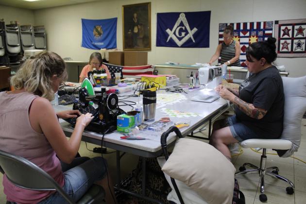 Rachel Pearson, left, of Earlsboro, and Heather Curtis, of Bethel, work on sewing projects at Quilt Camp.
