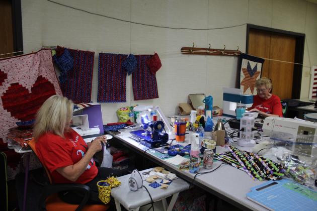 Carol Cramer-Short and her mother, June Cramer, both of Stillwater, work on quilting projects at Quilt Camp on June 25.