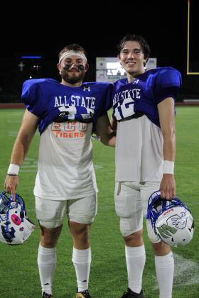 Bethel graduates Corey Metscher and John Gordon pose following the All-State Football game on July 29.