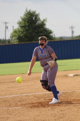 Bethel pitcher Annie Compton hurls one over home plate during the game against SouthMoore on Aug. 8. After a delay for rain, SouthMoore won the first fastpitch home game of the season, 10-0. Countywide &amp; Sun/Natasha Dunagan