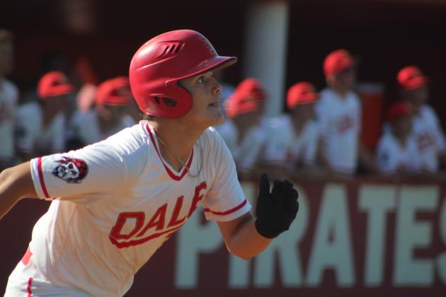 Dale’s Ethan Douglas keeps an eye on the ball as he runs to first base after hitting a double during the home game.
