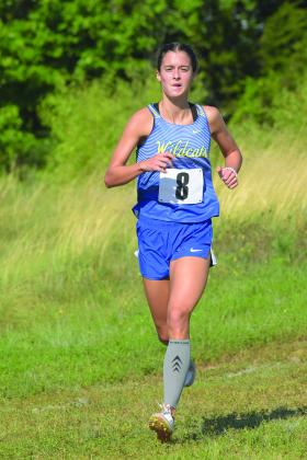 Bethel sophomore Baylee Tapley runs in the Stroud Cross Country Meet on Aug. 13. Tapley placed first with a 6:01.75 in the one-mile race. Fellow sophomore Kylie Nunneley came in second, followed by freshman Grace Epperley in seventh, sophomore Shyla Arnold in ninth, and senior Bella Thomas in 10th. Photo provided by Brian Blansett.