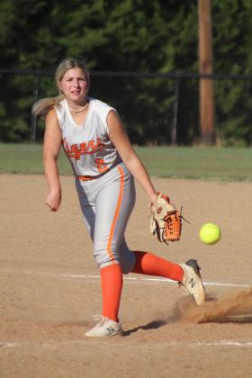 Maud pitcher Shaelynn Fletcher kicks up dust as she hurls one over the plate during the fastpitch home game against Bowlegs on Aug. 25. Maud won 11-0. Countywide &amp; Sun/Natasha Dunagan