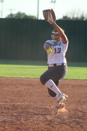Shawnee's Anneca Anderson winds up the pitch during the eighth inning of the district home game on Sept. 20. The Lady Wolves lost, 1-2, in extra innings. Countywide &amp; Sun/Natasha Dunagan