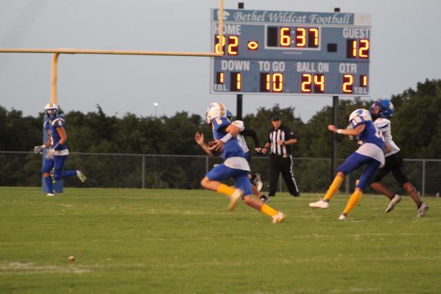 Bethel sophomore Bryce Tapley (#5) runs the ball, as junior Reagan Curry (#10) blocks a Classen SAS player during the season opening home game on Sept. 2. Bethel won 43-12. Countywide &amp; Sun/Natasha Dunagan