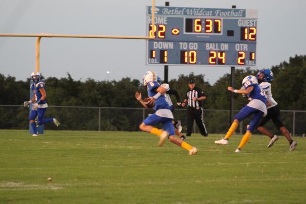 Bethel sophomore Bryce Tapley (#5) runs the ball, as junior Reagan Curry (#10) blocks a Classen SAS player during the season opening home game on Sept. 2. Bethel won 43-12. Countywide &amp; Sun/Natasha Dunagan