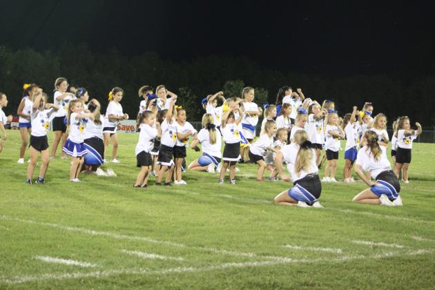 The Little Miss Wild Kitty cheerleaders perform.