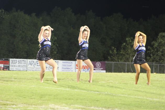 The newly-formed Bethel Pom Squad performs for the first time during halftime of the season opening Bethel home game against Classen SAS on Sept. 2. They are, from left, Piper Whitecotton, Kinsley Clanin and Portlynn Franetovich. Countywide &amp; Sun/Natasha Dunagan