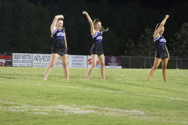 The new Bethel High School Pom Squad performs at halftime for the first time.