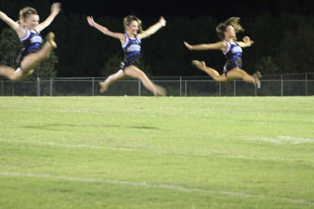 The new Bethel High School Pom Squad performs at halftime for the first time.