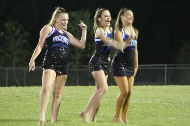 The new Bethel High School Pom Squad performs at halftime for the first time.