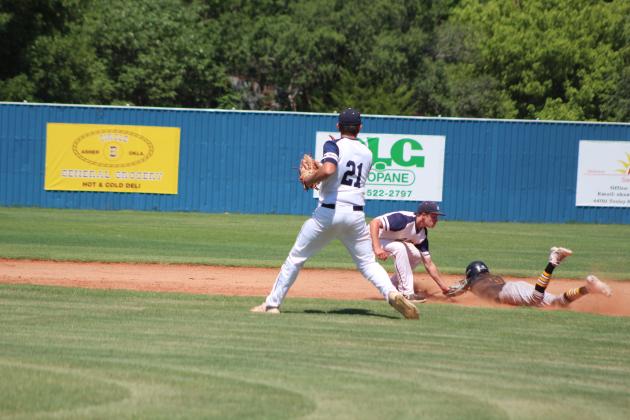 Asher second-baseman Kelby Fowler tries to tag a Boswell runner, as first-baseman Brogan Culwell (#21) runs after him, during the fourth inning of the first home game in a double header against Boswell on Sept. 3. Asher lost 1-12 and then 3-4. Countywide &amp; Sun/Natasha Dunagan