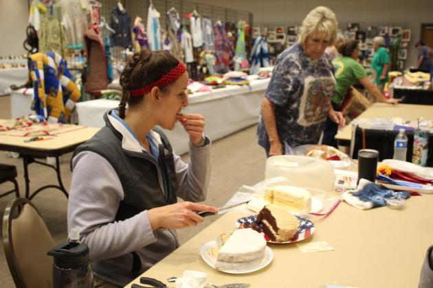 Shawnee Milling Company Production Developer Mackenna Heath judges three cakes, as Oklahoma Home and Community Education (OHCE) Dale Chapter member Laqueda Steward keeps her supplied with baked goods before they are awarded ribbons and put on display at the Pottawatomie County Free Fair at the Heart of Oklahoma Expo Center on Sept. 8. In the Baking Contest, Cindy Larson won the senior division, and Adalyn Larson won the junior division. Countywide &amp; Sun/Natasha Dunagan