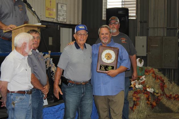 Pottawatomie County Free Fair Vice Chairman Matt Griffith, right, presents a clock to Harold Walden who is retiring from the Fair Board after more than 35 years of service. Also shown are Fair Board members Dr. Joe Taron, Gary Barnett, and Tim Underwood. Countywide &amp; Sun/Natasha Dunagan