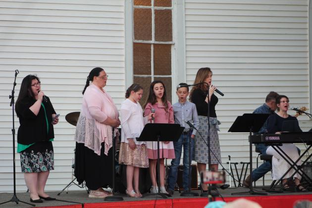 A group from Holiness Church sings "It Only Takes One" during the Frontier Days Gospel Sing at Broadway Chapel, in Tecumseh, Sept. 15. Four groups and two individuals from area churches participated in the Gospel Sing. Countywide &amp; Sun/Natasha Dunagan