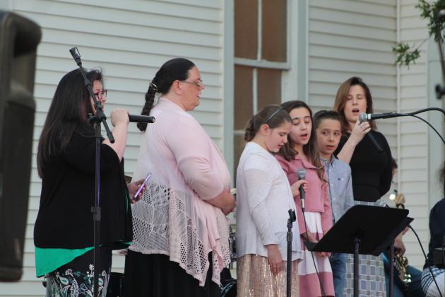 A group from Holiness Church sings "It Only Takes One" during the Frontier Days Gospel Sing at Broadway Chapel, in Tecumseh, Sept. 15. Four groups and two individuals from area churches participated in the Gospel Sing. Countywide &amp; Sun/Natasha Dunagan
