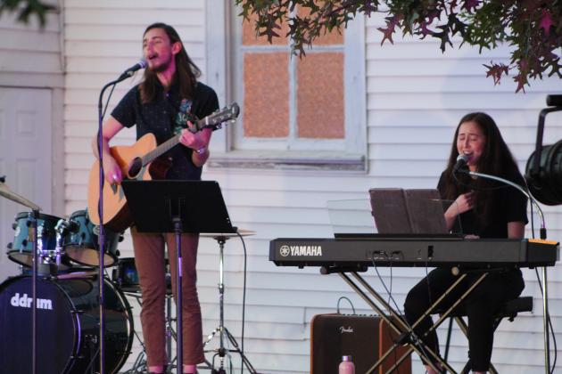The musical directors from First Baptist Church - Tecumseh, Cameron Clark and Ariel Kim sing "Nothing but the Blood" during the Frontier Days Gospel Sing at Broadway Chapel, in Tecumseh, Sept. 15. Four groups and two individuals from area churches participated in the annual event. Countywide &amp; Sun/Natasha Dunagan