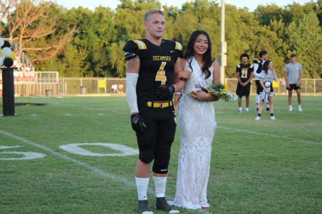 Tecumseh Junior Attendant Serenity Jacoway is escorted onto the field by senior Garrett Chaffin during the THS Football Homecoming on Sept. 16. Countywide &amp; Sun/Natasha Dunagan