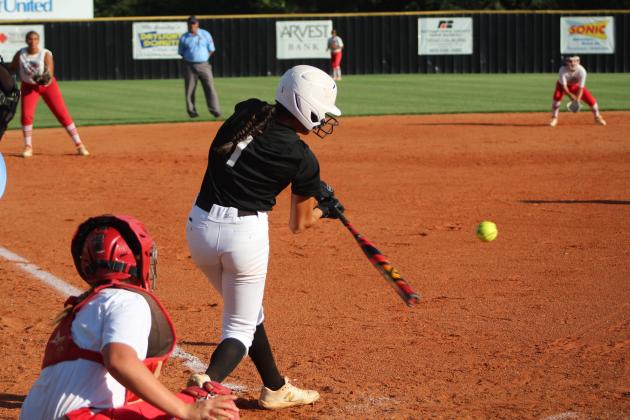 Tecumseh's Serenity Jacoway hits a double during the home game against McLoud on Sept. 19. Tecumseh won 12-0. Countywide &amp; Sun/Natasha Dunagan