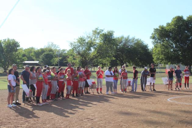 The seniors on the Earlsboro fastpitch and cross country teams are celebrated, along with their family members, before the varsity fastpitch game on Sept. 20.  They are Tahnya Kennedy, Mariana Siqueiros, Alexandra Peters, Jamie Smith, Sierra Smith, Chelsea Deer, Andrew Moore, Greg Smith and Jace Fitzgerald. Countywide &amp; Sun/Natasha Dunagan