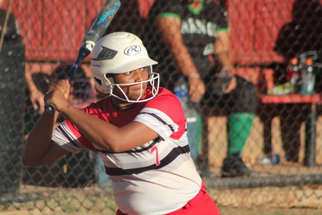 Earlsboro senior Alexandra Peters prepares to hit a single during the home game against Varnum on Sept. 20. The Lady Wildcats fastpitch and the cross country team also held their Senior Night ceremonies before the game. Varnum won 13-4. Countywide &amp; Sun/Natasha Dunagan