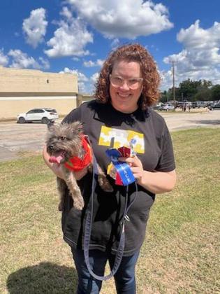 Alisha Jonker holds Kipper, who won "Best Groomed" in the Frontier Days Pet Show on Sept. 17. Photo provided by Caitlyn Mertz of Tecumseh Vet Clinic.