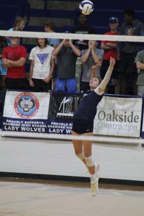 Shawnee's Jordan Tash serves during the game with Coweta on Sept. 29. Shawnee lost 1-3. Countywide &amp; Sun/Natasha Dunagan