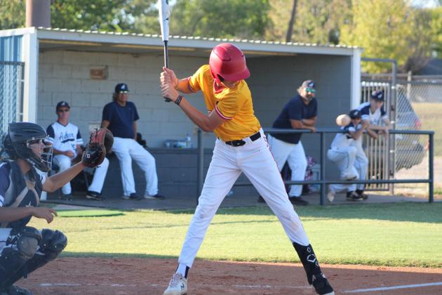 Dale's Jake Green watches the ball before eventually taking a walk, as Asher catcher Garrett Leba lines up his glove, during the Asher home game on Sept. 26. Dale won that game, 12-0.  Later, on Sept. 29, they lost their regional game at Silo, 2-9. Countywide &amp; Sun/Natasha Dunagan