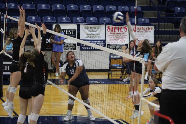 Shawnee's Harlee Bullard (#10) returns the ball, as teammate Kanynn Kaseca (#13), during the Senior Night game with Coweta on Sept. 29. Shawnee lost 1-3. Countywide &amp; Sun/Natasha Dunagan