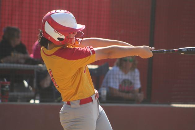 Dale's Karsen Griggs hits a triple in the fifth inning of their second regional home game against Wyandotte, Sept. 30. The Dale Lady Pirates won 5-4. The previous day, Sept. 29, they had also won the first regional game with Wyandotte, 10-5, and with Colcord, 12-6. Dale will play in the State Tournament at the Softball Hall of Fame Arena today at 11 am on Field 2, according to the OSSAA website. Countywide &amp; Sun/Natasha Dunagan