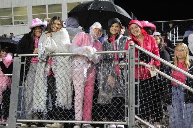 Tecumseh's students and fans were bundled up and waterproofed for the rainy Pink Out home game against Bridge Creek on Oct. 28. Countywide &amp; Sun/Natasha Dunagan