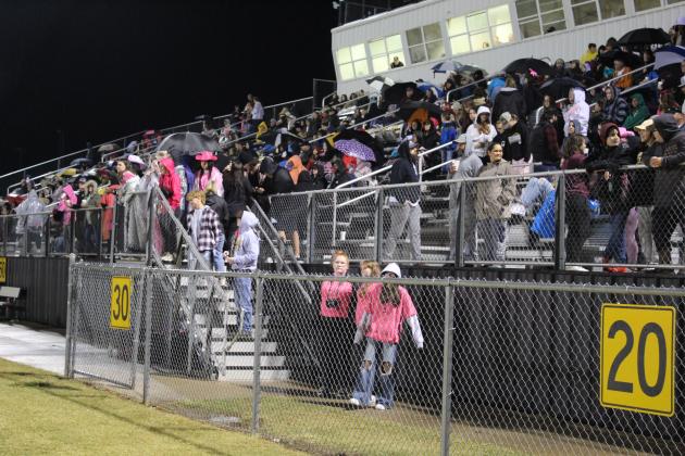 Tecumseh's students and fans were bundled up and waterproofed for the rainy Pink Out home game against Bridge Creek on Oct. 28. Countywide &amp; Sun/Natasha Dunagan