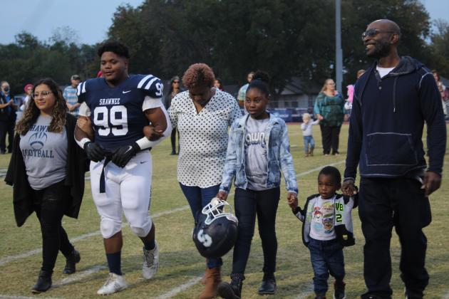 Shawnee senior Nalyshua Assiddiq-Perez and his family were among nine football players recognized during Shawnee High School's Senior Night ceremonies on Thurs., Nov. 3. There were 46 seniors honored in cross country, football, band, color guard, choir, cheer and pom. Countywide &amp; Sun/Natasha Dunagan