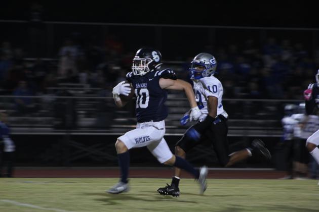 After intercepting a pass by Guthrie, Shawnee sophomore Ryan High carries the ball during the Senior Night home game on Thurs., Nov. 3. Shawnee lost 0-43. Countywide &amp; Sun/Natasha Dunagan