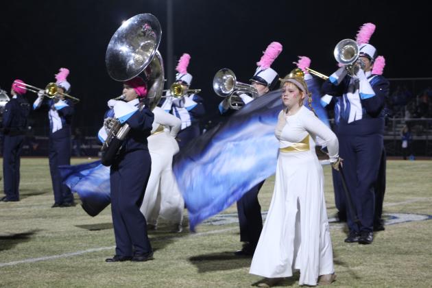 The color guard and marching band members in "The Pride of the Pack" perform "Astral Odyssey" during half time of the Shawnee home game on Nov. 3. The Shawnee band recently placed 12th in the Owasso State Marching Contest, according to the Shawnee Bands Facebook page. This performance was also dedicated to breast cancer survivors. Countywide &amp; Sun/Natasha Dunagan