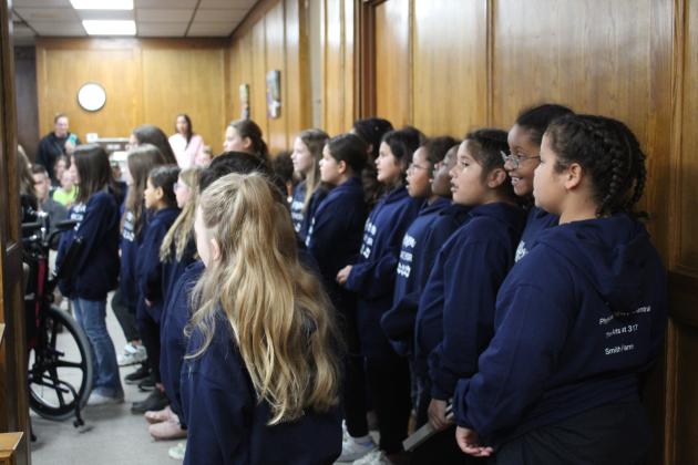 The Jefferson Honor Choir, led by Teresa Swadley, perform for the Shawnee Board of Education at their meeting on Nov. 7. Countywide &amp; Sun/Natasha Dunagan