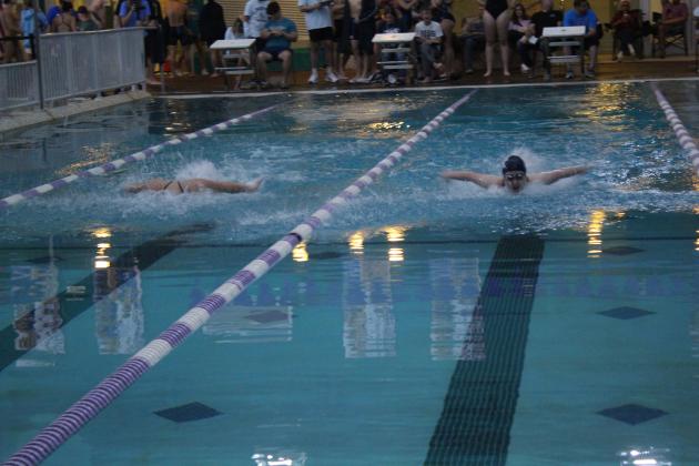 Shawnee junior McKayla Tinkle and senior Clara Timmons compete in the Girls 100 Yard Butterfly during the swim meet with Moore, Southmoore and Westmoore athletes on Nov. 10 at the Shawnee YMCA. Timmons placed first in the event with a 1:11.78, and Tinkle was second at 1:16.14. Shawnee placed first in the Combined Team Scores, with 803 points. They had 416 points for the women and 387 points for the men. Countywide &amp; Sun/Natasha Dunagan