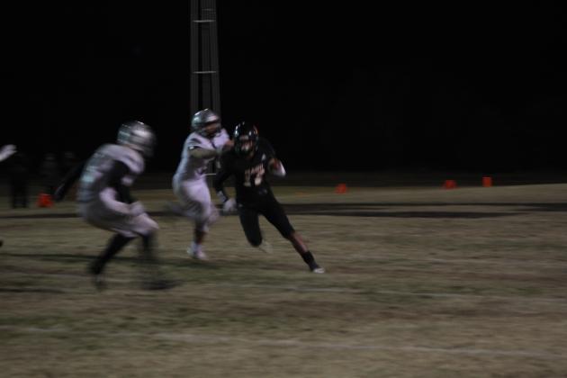 Maud senior Gavin Ridge runs the ball in the Class C OSSAA Quarterfinal home game against Timberlake on Nov. 18. After winning 11 straight games, the Maud Tigers lost to the Timberlake Tigers, 24-64. Countywide &amp; Sun/Natasha Dunagan