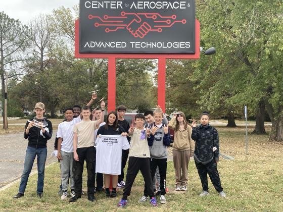 Twelve "Launching Into Aviation" students from Shawnee High School got to visit Okmulgee's Center for Aerospace &amp; Advanced Technologies on Nov. 2. They toured the facility, listened to experts, and participated in a flight simulator contest. Photo provided by Joshua Watson.
