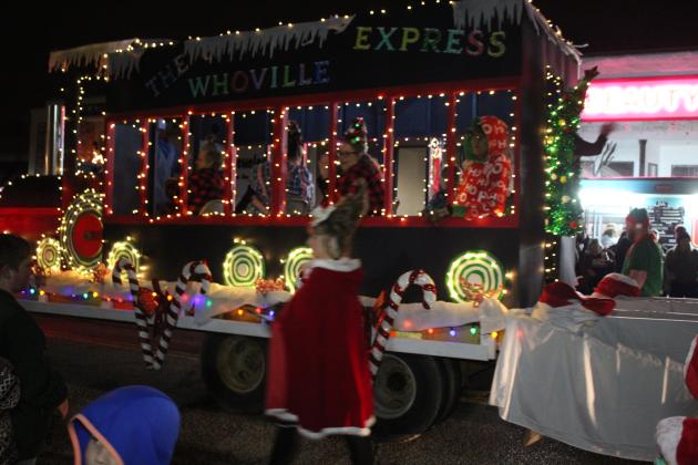 The Whoville Express chugs along in the Grinchmas Holiday Parade and Marching Band Contest in Tecumseh on Dec. 8. The parade, organized by the Tecumseh Chamber of Commerce, had 57 entries, and the City of Tecumseh sponsored the Marching Band Contest, which had five entries. The City also brought the Whoville Express and won second place. Countywide &amp; Sun/Natasha Dunagan