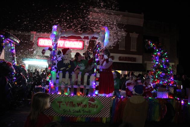 The Tecumseh 4H-FFA Booster Club float was pulled by a tractor and produced snow from its roof for the Grinchmas Holiday Parade and Marching Band Contest in Tecumseh on Dec. 8. They won first place. Countywide &amp; Sun/Natasha Dunagan