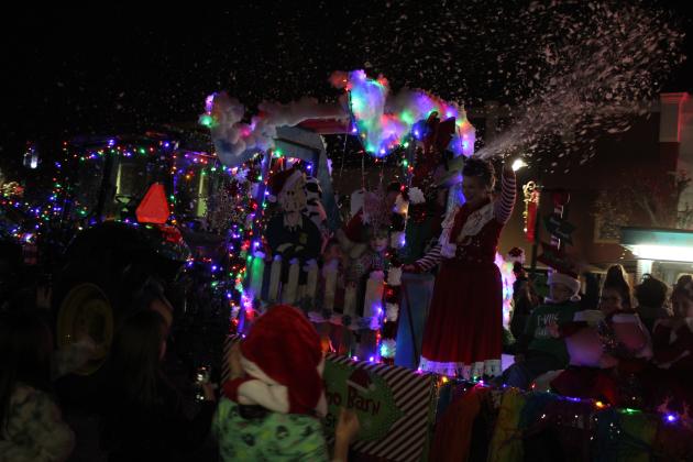 The Tecumseh 4H-FFA Booster Club float was pulled by a tractor and produced snow from its roof for the Grinchmas Holiday Parade and Marching Band Contest in Tecumseh on Dec. 8. They won first place. Countywide &amp; Sun/Natasha Dunagan