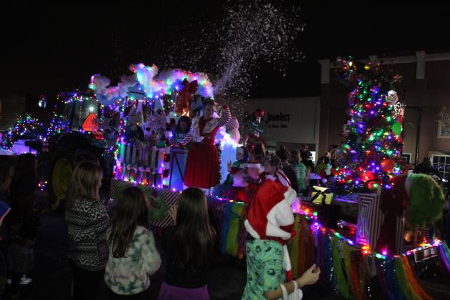 The Tecumseh 4H-FFA Booster Club float was pulled by a tractor and produced snow from its roof for the Grinchmas Holiday Parade and Marching Band Contest in Tecumseh on Dec. 8. They won first place. Countywide &amp; Sun/Natasha Dunagan