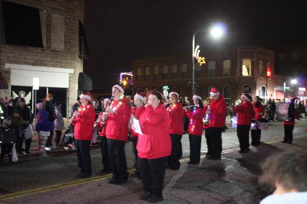 The Douglass High School Marching Band performs in the Grinchmas Holiday Parade and Marching Band Contest in Tecumseh on Dec. 8. They won second place in the band contest, earning them $750 and a trophy from the City of Tecumseh. Cushing's band won third place, and Tecumseh won first. Countywide &amp; Sun/Natasha Dunagan