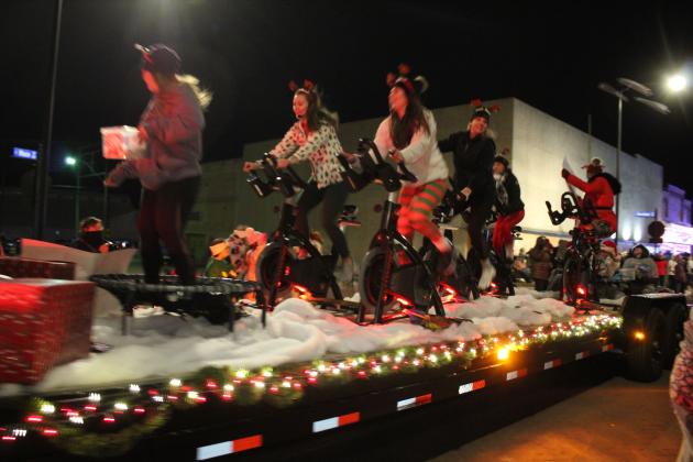 The Lifted Fitness Studio float won first place in the Shawnee Christmas Parade on Dec. 1 out of 88 entries. The Shawnee Square Eights took second place, and the Potawatomi Fire placed third. The Mayor's Pick was the Shawnee Soccer Association's entry, and the Grand Marshal's Pick was the Pottawatomie County Public Safety Center float. Community Renewal of Pottawatomie County contracted with the City of Shawnee to organize the parade, which is nearly 50 years old, said Sophia Wells, Marketing and Communicat