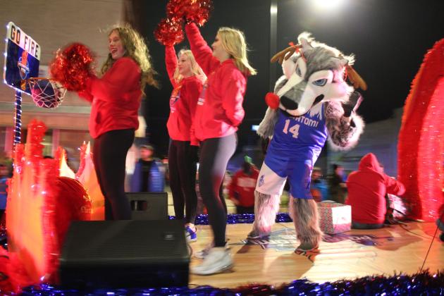 Mo the Fire Wolf and three of the Fire Girls ride on the Potawatomi Fire float in the Shawnee Christmas Parade on Dec. 1. The Fire float won third place out of 88 entries. Countywide &amp; Sun/Natasha Dunagan
