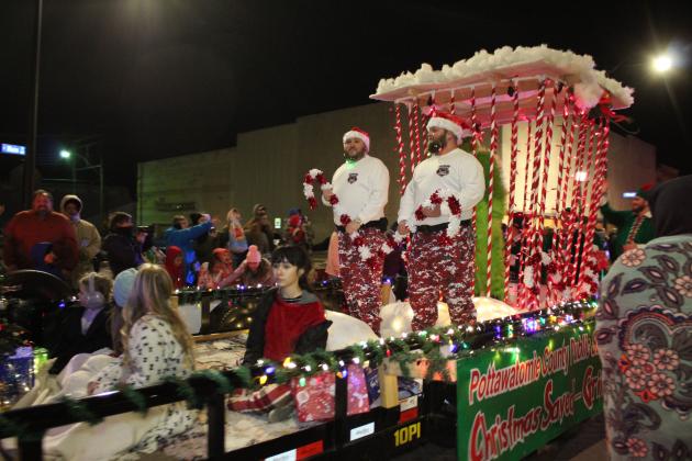 The "Santa Police" guard the Grinch on the Pottawatomie County Public Safety Center float in the Shawnee Christmas Parade on Dec. 1. The Grand Marshal was OBU President Dr. Heath Thomas, and this float received the Grand Marshal's Pick award out of 88 entries. This was the first year for Community Renewal of Pottawatomie County to contract with the City of Shawnee for the parade, said CRPC Marketing and Communications Coordinator Sophia Wells, and Vyve Broadband was the title sponsor. Countywide &amp; Sun/Natas