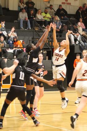 Maud's Reese Street sinks a jump shot in the third quarter of the home game against Calvin on Jan. 12. The Maud Lady Tigers lost 27-78. Countywide &amp; Sun/Natasha Dunagan